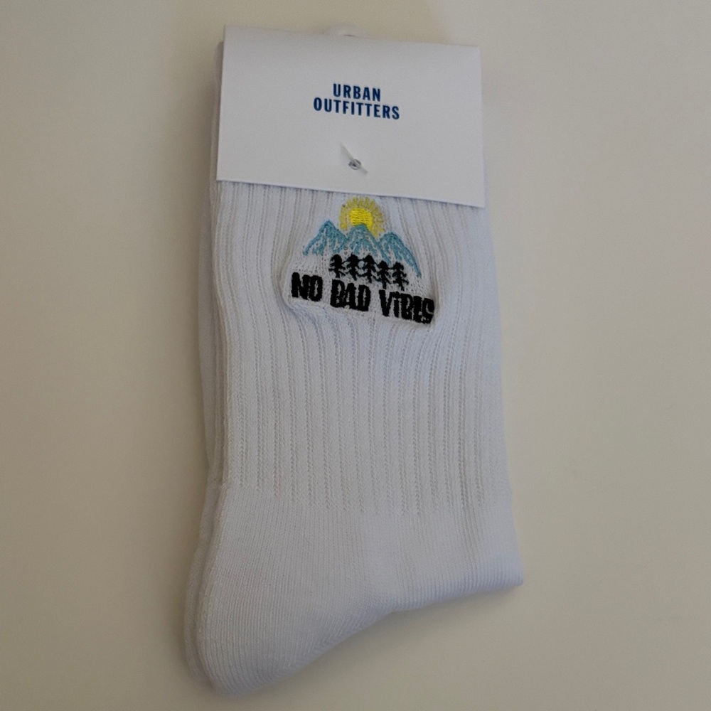 Urban Outfitters White Casual Socks with No Bad Vibes Design